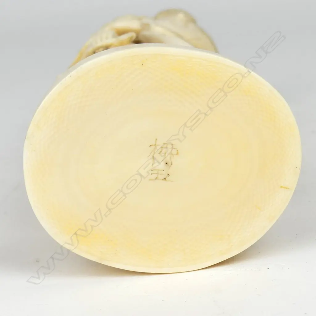 A Japanese Meiji period ivory figure of a woman Image 1++