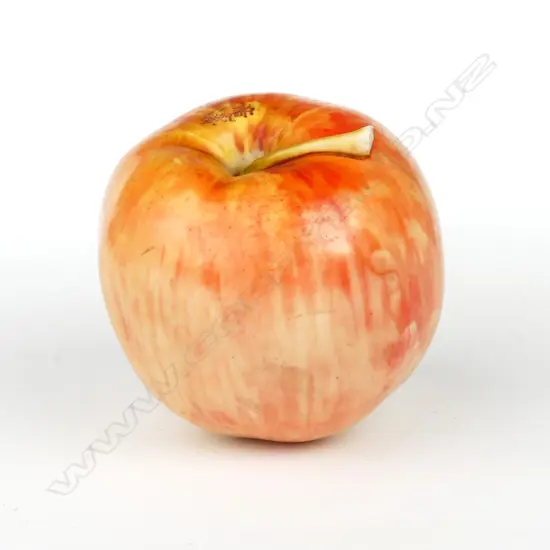 A Japanese ivory okimono apple