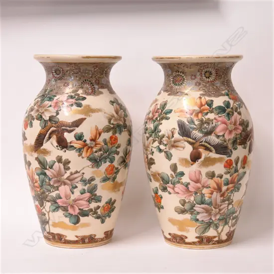 A pair of c.1880 Japanese mirror matched decorated vases signed Kinkozan