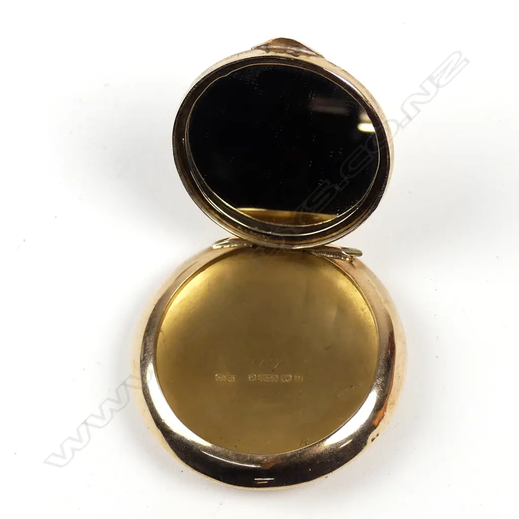 An early 1900s 9ct gold small powder compact Image 1++