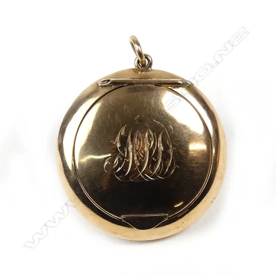 An early 1900s 9ct gold small powder compact