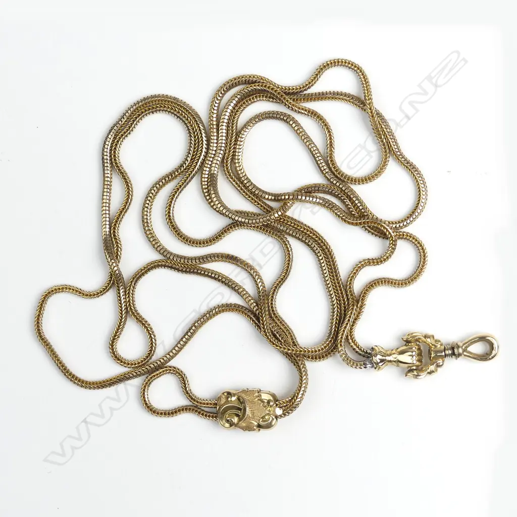 A Victorian 9ct. yellow gold muff chain Image 1++