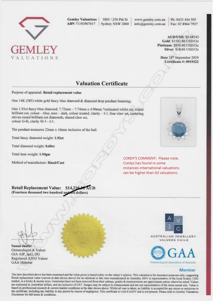 A 14ct white gold and diamond pendant Image 1++