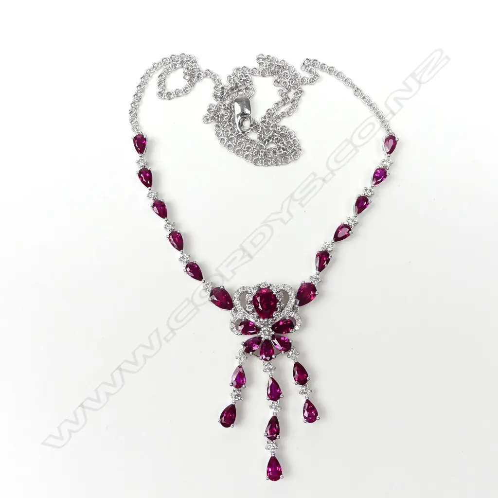 An 18ct white gold diamond and ruby necklace Image 1++