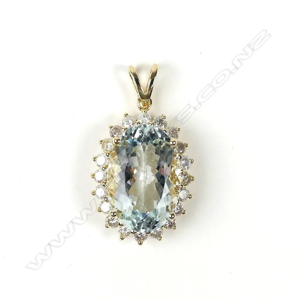 A 14ct yellow gold aquamarine and diamond pendant Image 1++