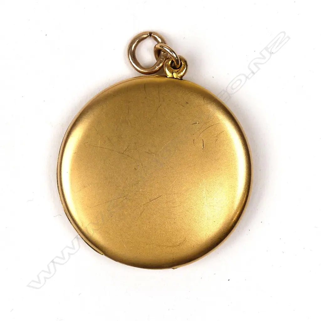 An American late 1800s gold plated locket Image 1++