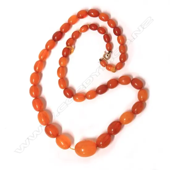 A vintage graduating amber bead necklace