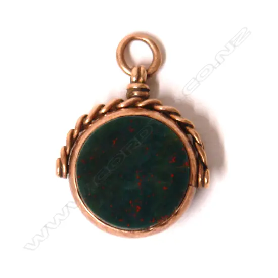 A c.1900 9ct. yellow gold fob spinner