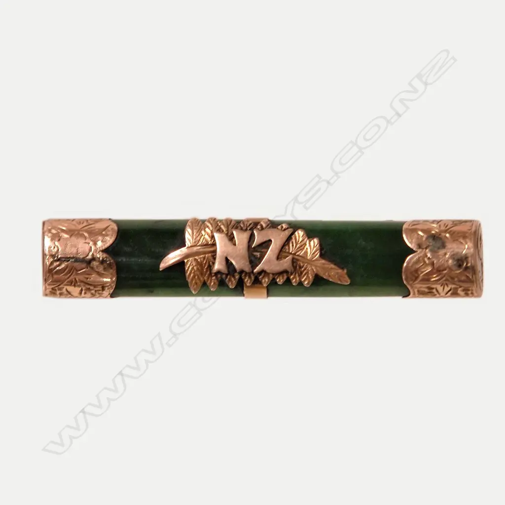 A N.Z. colonial 9ct. rose gold and greenstone 'N.Z.' bar brooch Image 1++