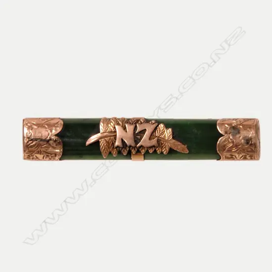 A N.Z. colonial 9ct. rose gold and greenstone 'N.Z.' bar brooch