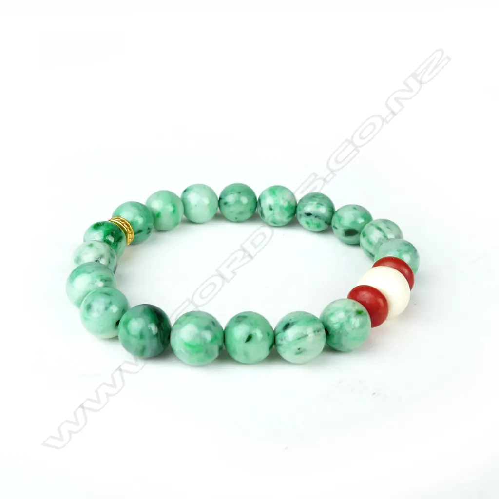 A jadeite and precious bead bracelet Image 1++
