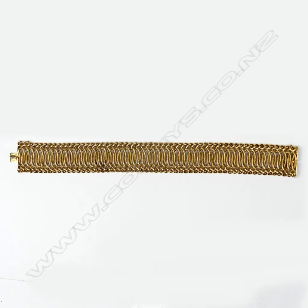 A c.1950 European 18ct. yellow gold wide bracelet Image 1++