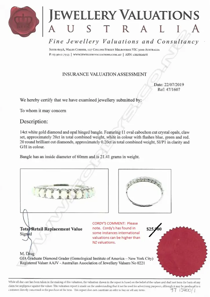 A 14ct white gold opal and diamond hinged bangle Image 1++