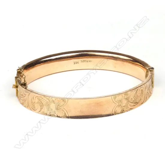 A vintage 9ct rose gold half hinged bangle