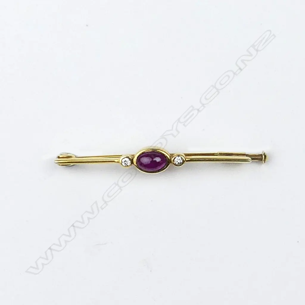 A vintage 18ct. yellow gold ruby and diamond bar brooch Image 1++