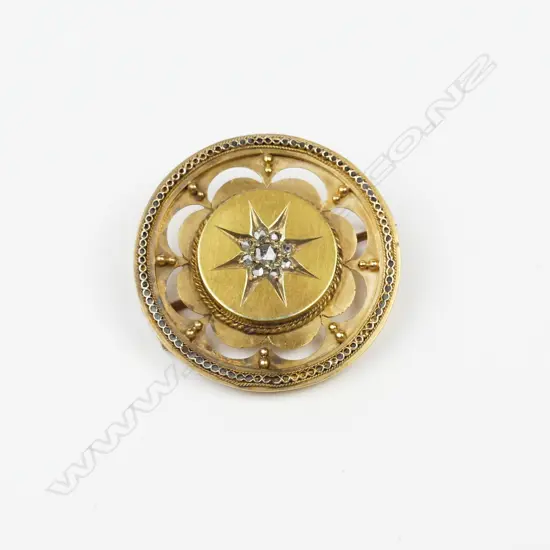 A Victorian gilded gold brooch