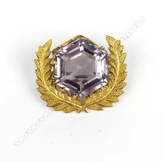 A vintage 15ct gold and amethyst brooch