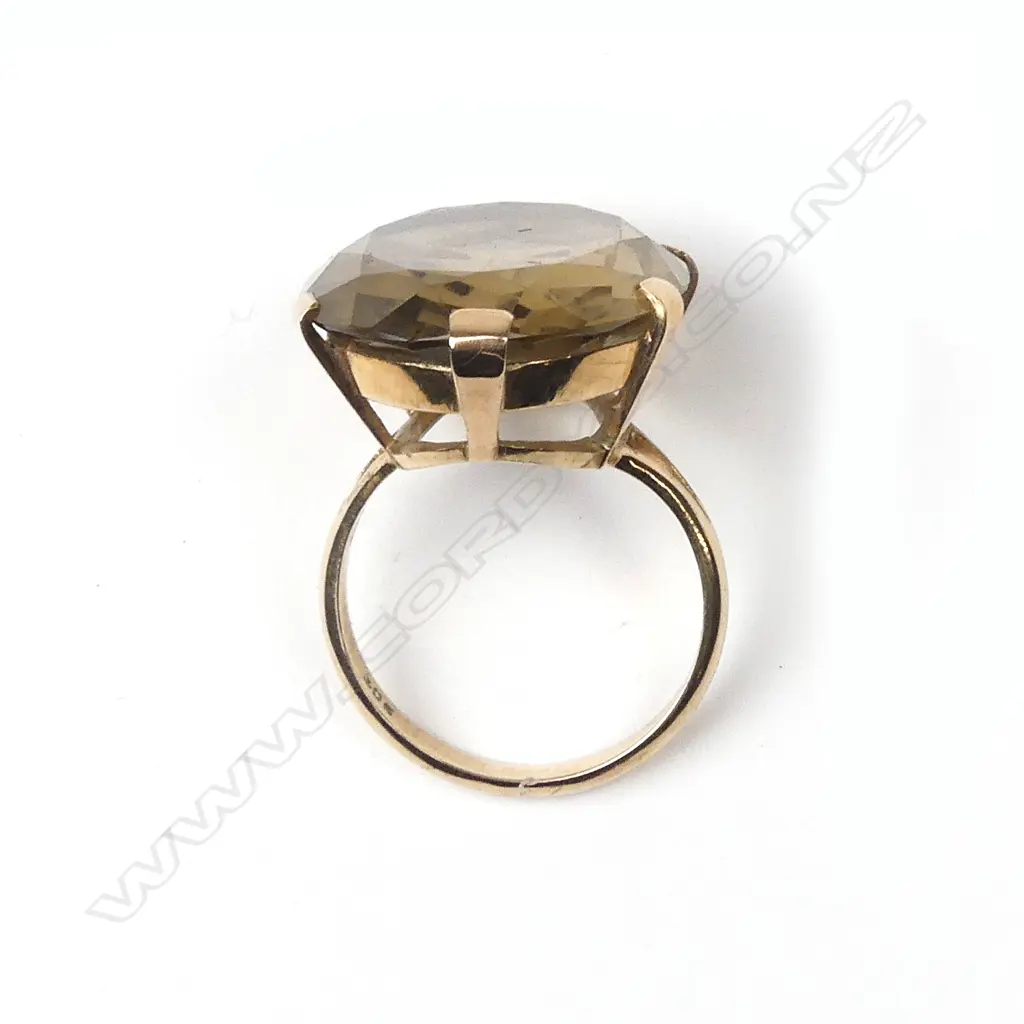 A 1970s large citrine and 9ct. gold ring Image 1++