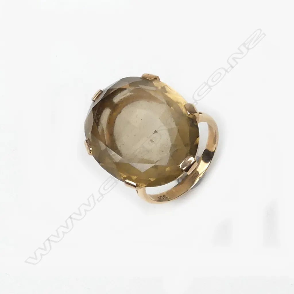 A 1970s large citrine and 9ct. gold ring Image 1++