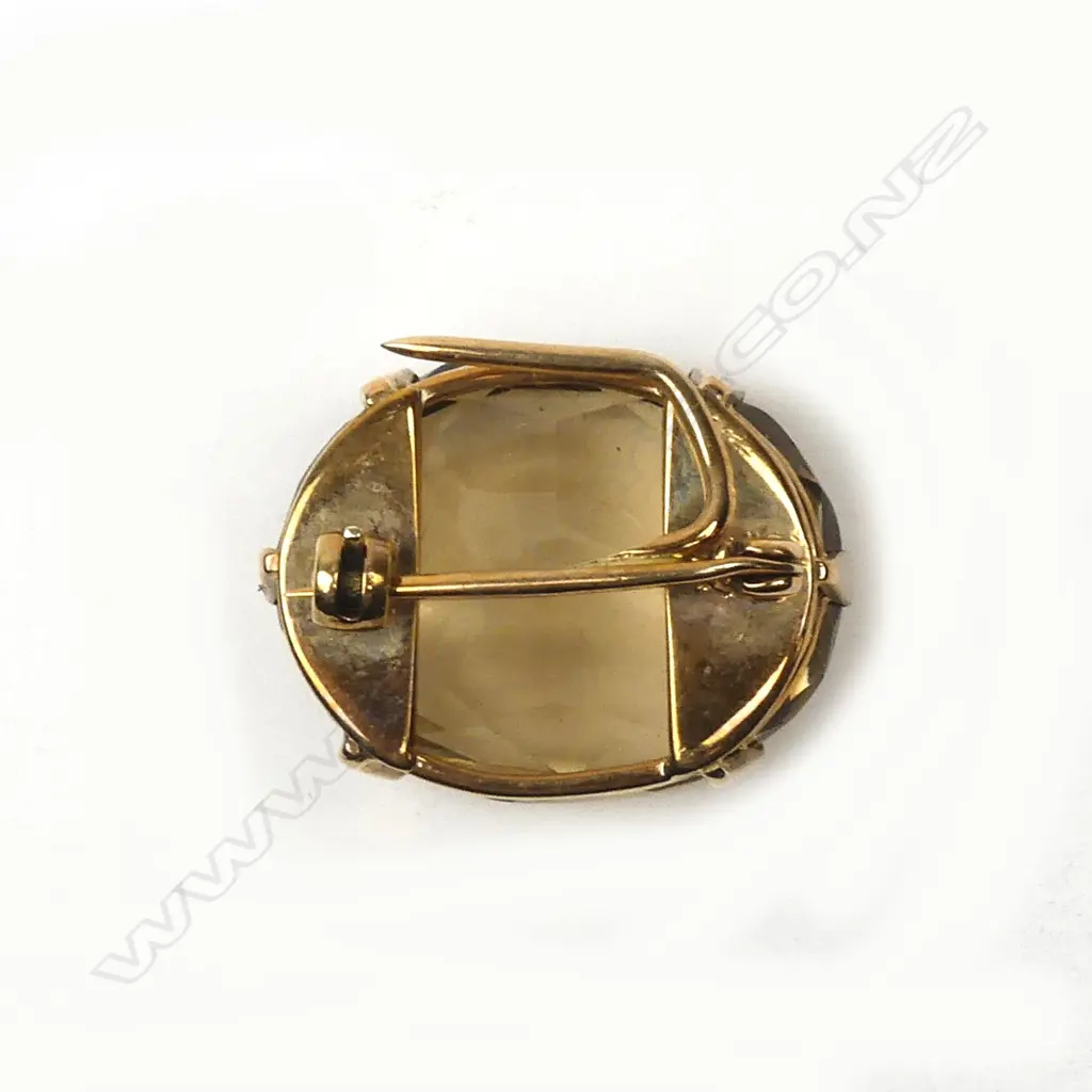 A 1970s large citrine and 9ct. yellow gold brooch Image 1++