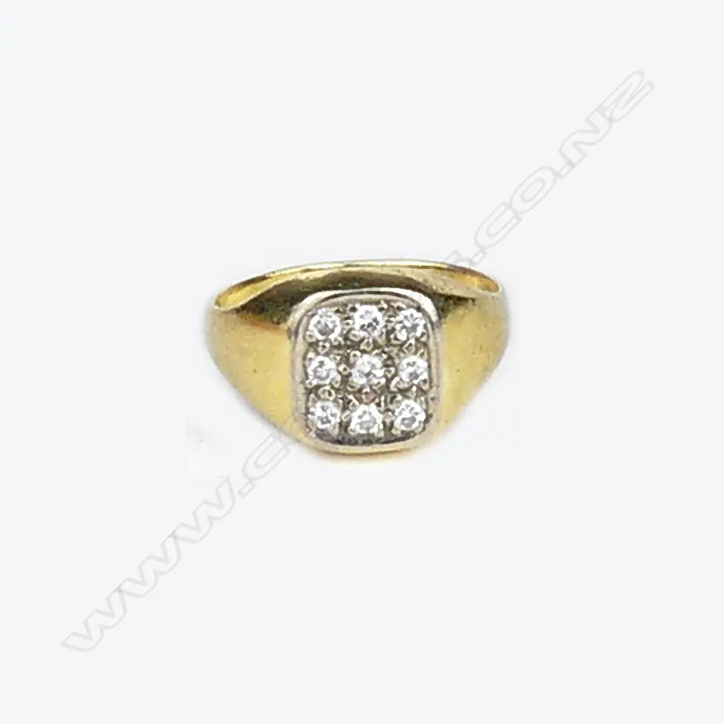 An 18ct. yellow gold and multi-diamond set signet ring Image 1++