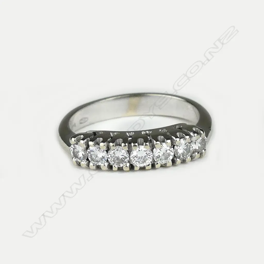 An 18ct seven stone diamond ring Image 1++