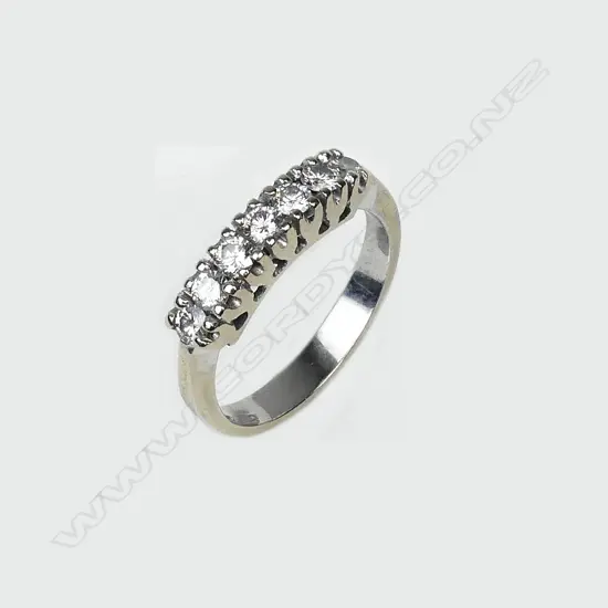 An 18ct seven stone diamond ring