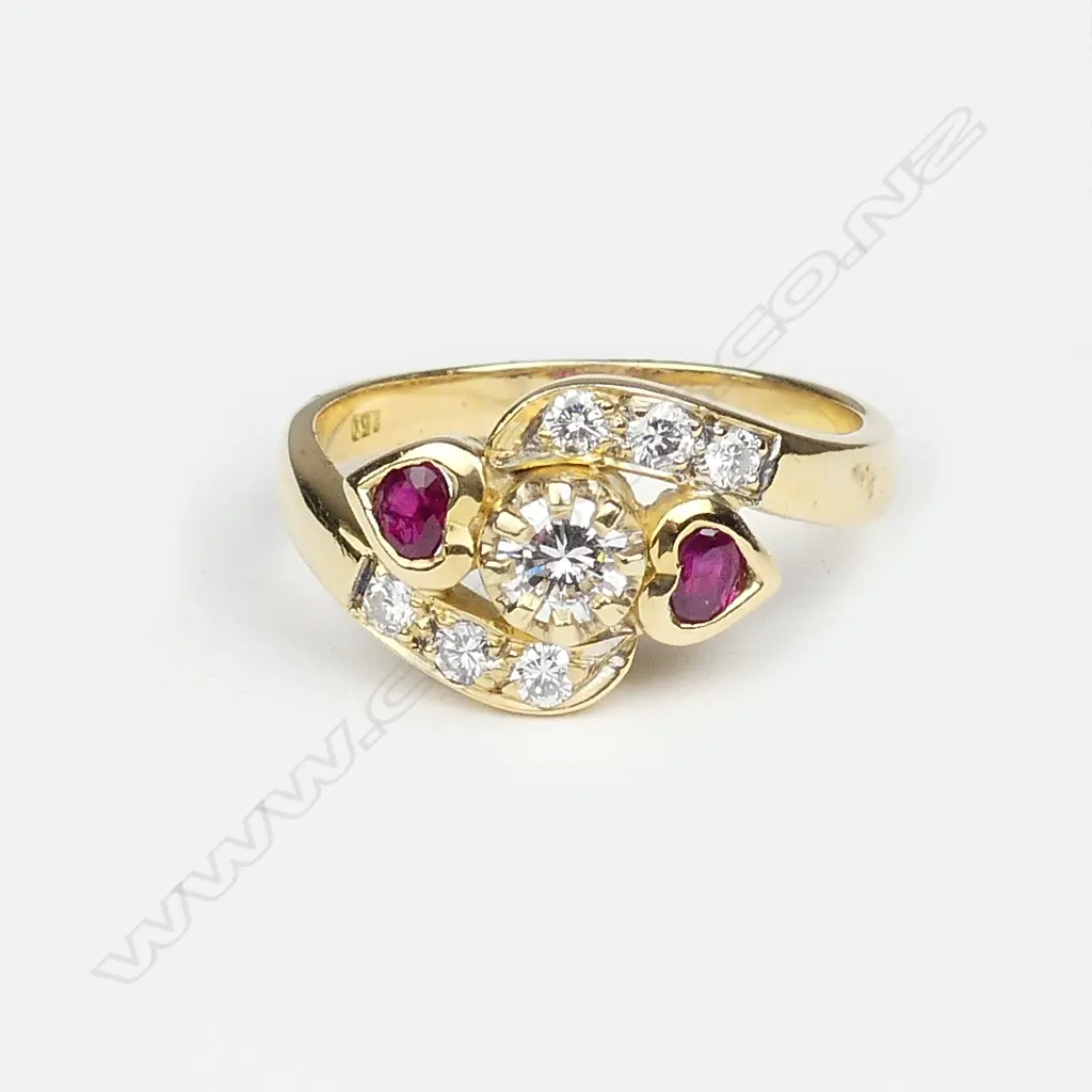 An 18ct. yellow gold ruby and diamond dress ring Image 1++