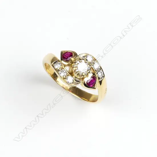 An 18ct. yellow gold ruby and diamond dress ring