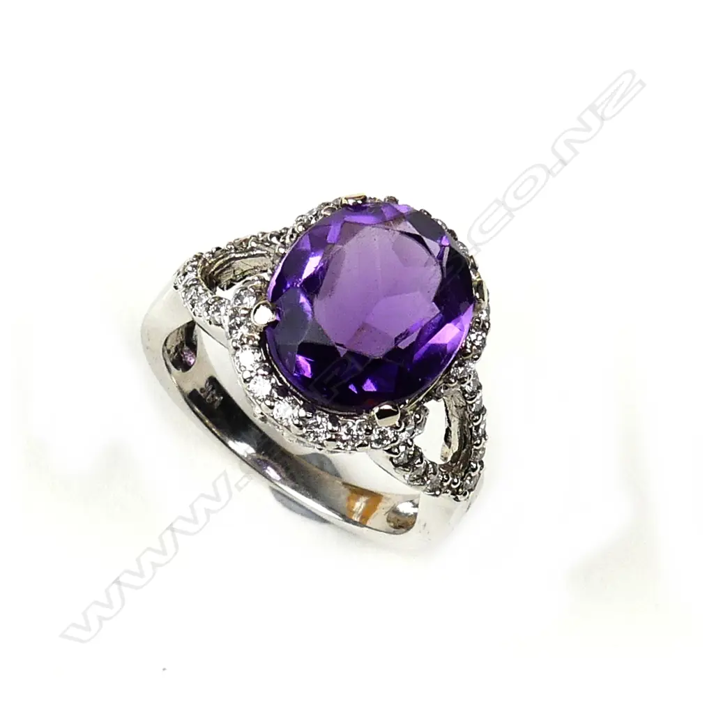 A 14ct. gold modern amethyst and diamond dress ring Image 1++