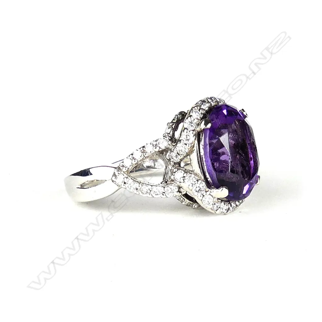 A 14ct. gold modern amethyst and diamond dress ring Image 1++