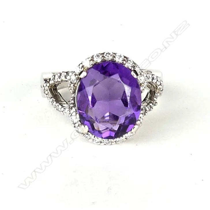 A 14ct. gold modern amethyst and diamond dress ring Image 1++