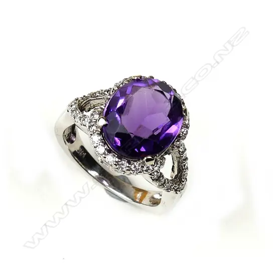 A 14ct. gold modern amethyst and diamond dress ring