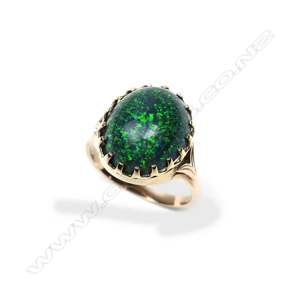 A retro 9ct gold and opal ring Image 1++