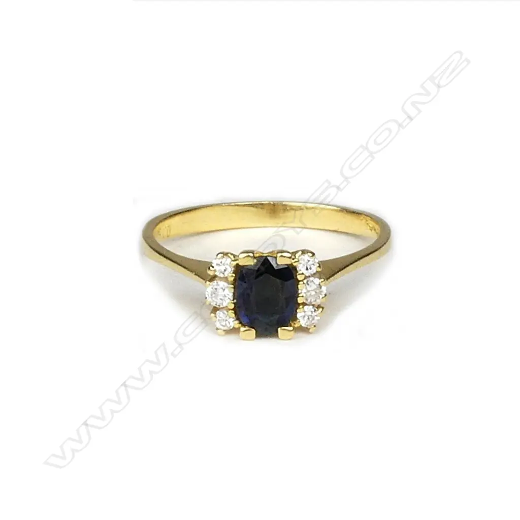 An 18ct gold sapphire and diamond ring Image 1++