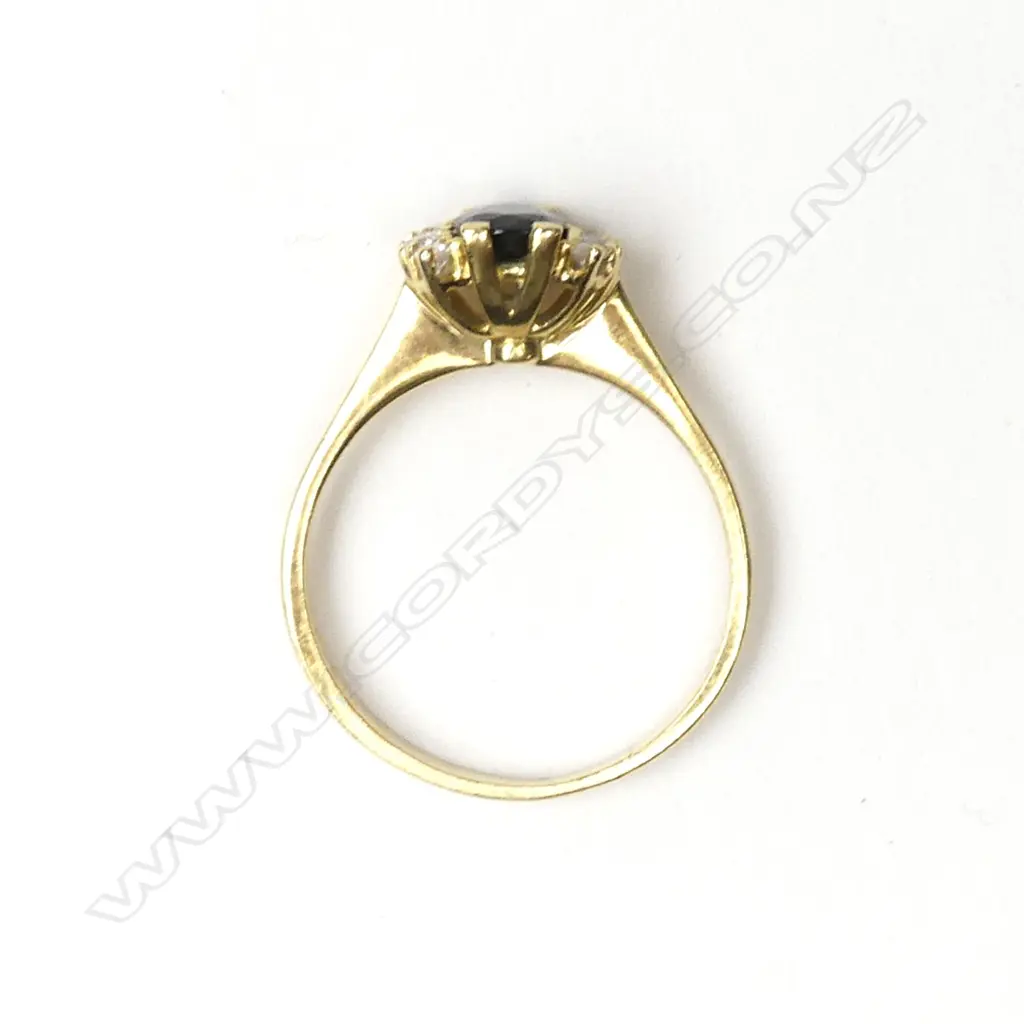 An 18ct gold sapphire and diamond ring Image 1++
