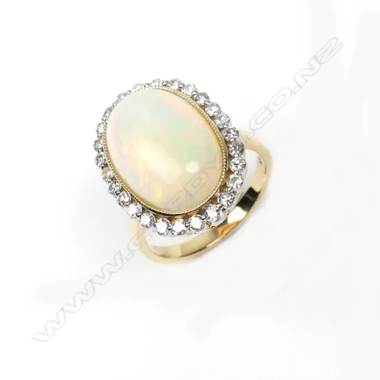 A 14ct yellow gold opal and diamond ring
