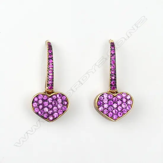 A pair of contemporary 18ct rose gold and pink sapphire earrings