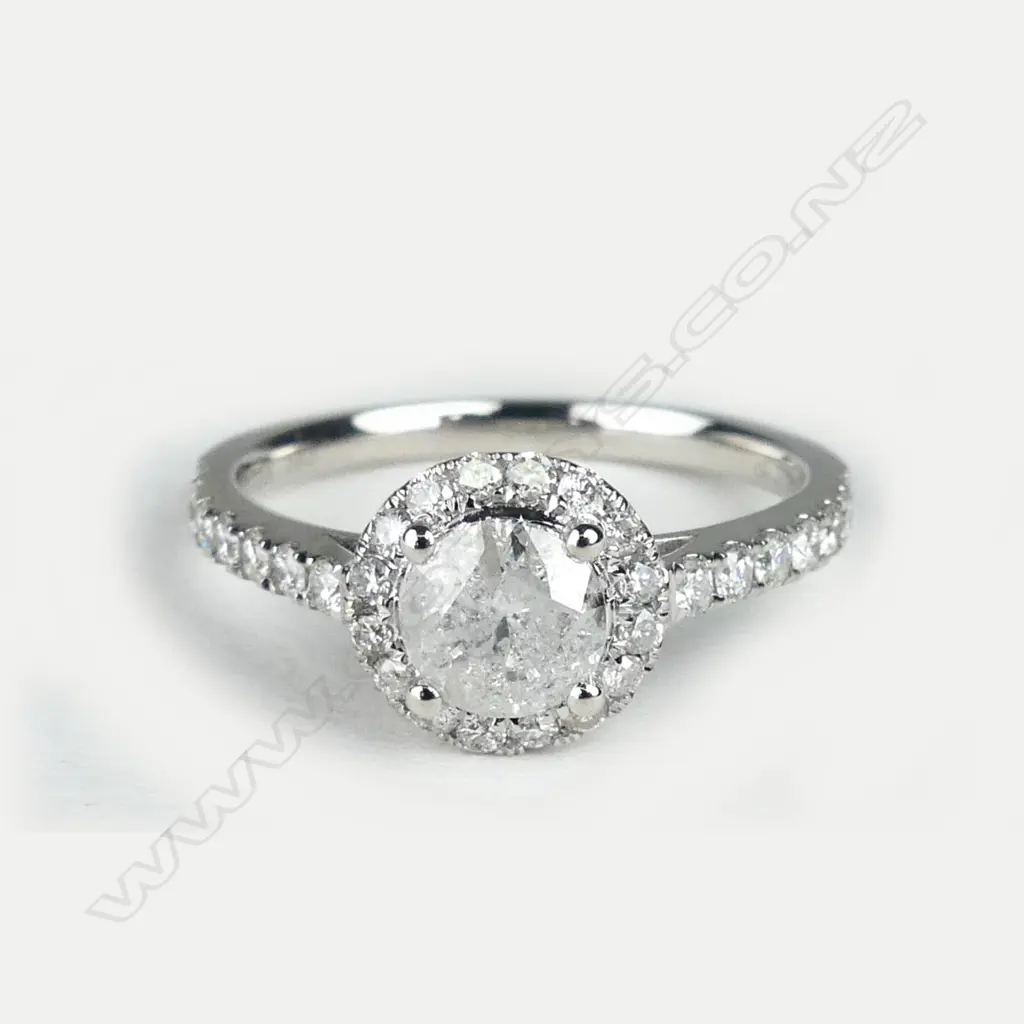 A 14ct white gold and diamond ring Image 1++