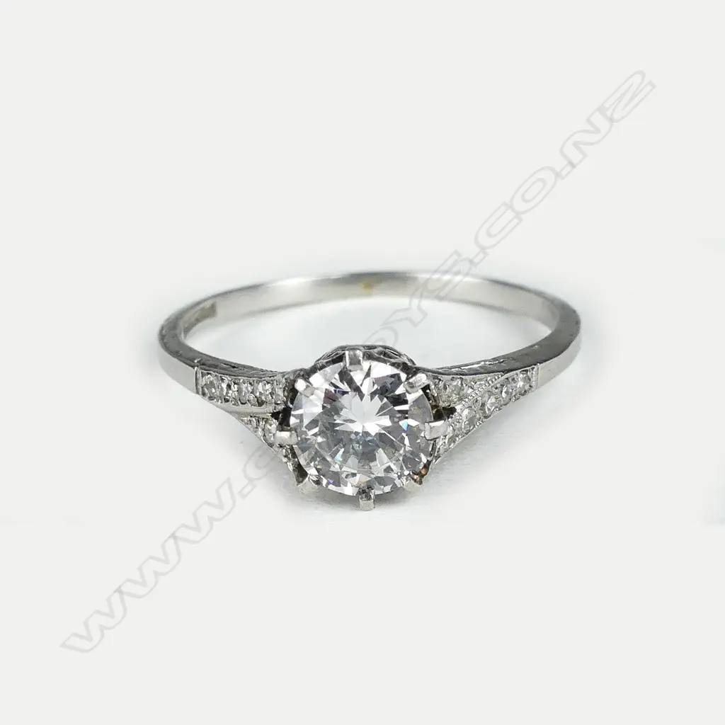 A platinum diamond solitaire diamond ring Image 1++