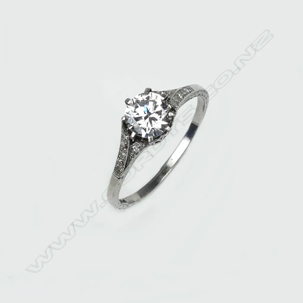 A platinum diamond solitaire diamond ring Image 1++