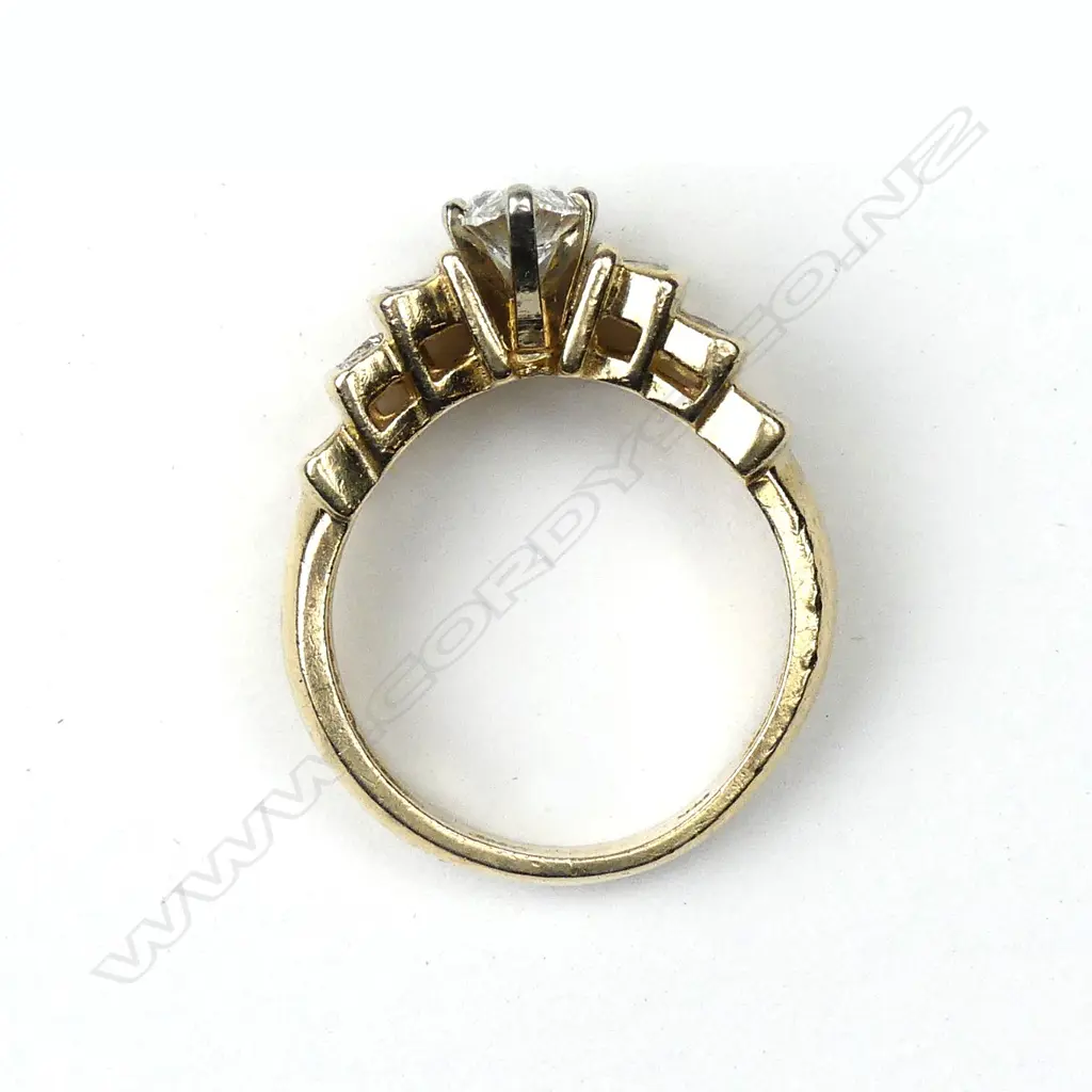 A 14k yellow gold multi diamond ring Image 1++