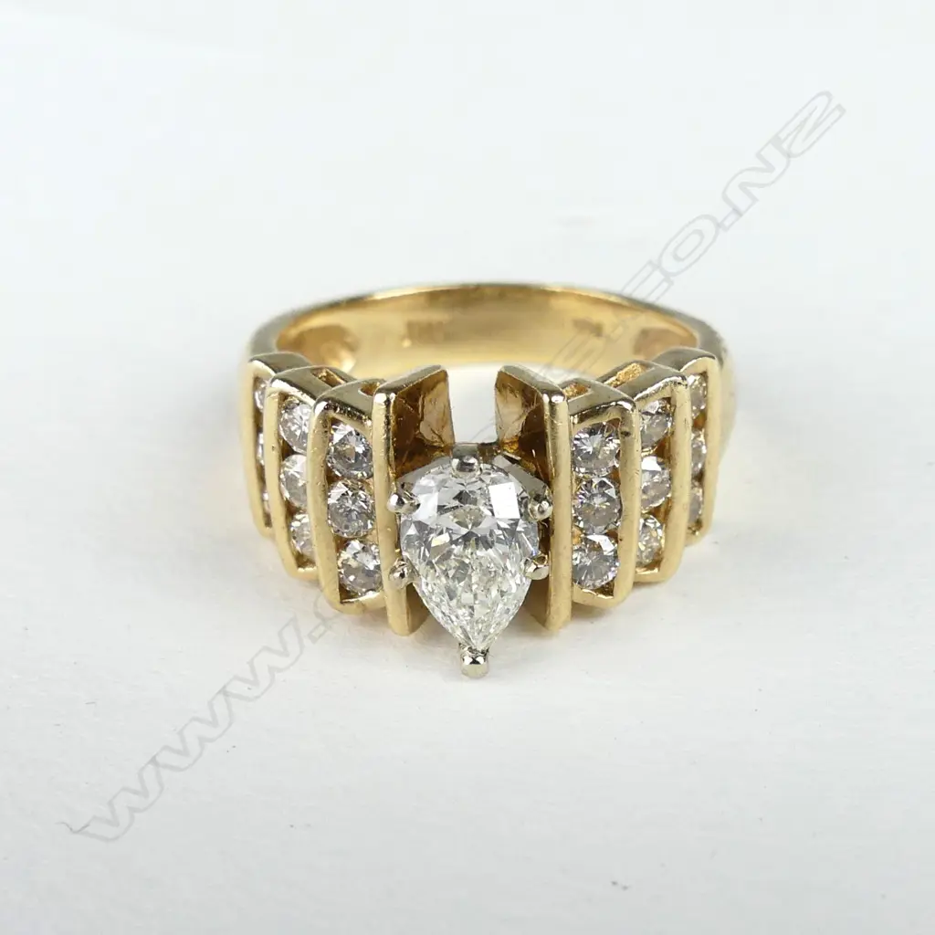 A 14k yellow gold multi diamond ring Image 1++