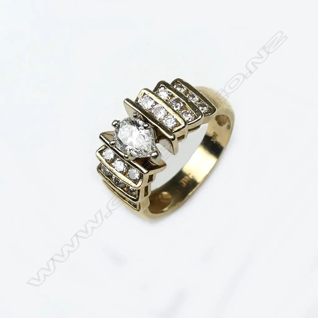 A 14k yellow gold multi diamond ring Image 1++