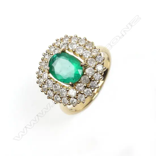A 14ct yellow gold emerald and diamond ring
