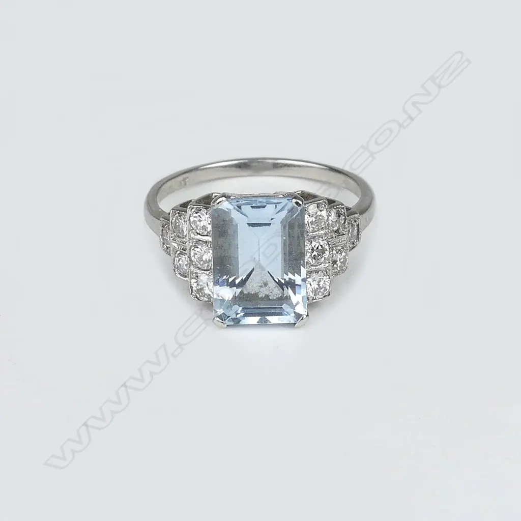 A platinum aquamarine and diamond ring Image 1++