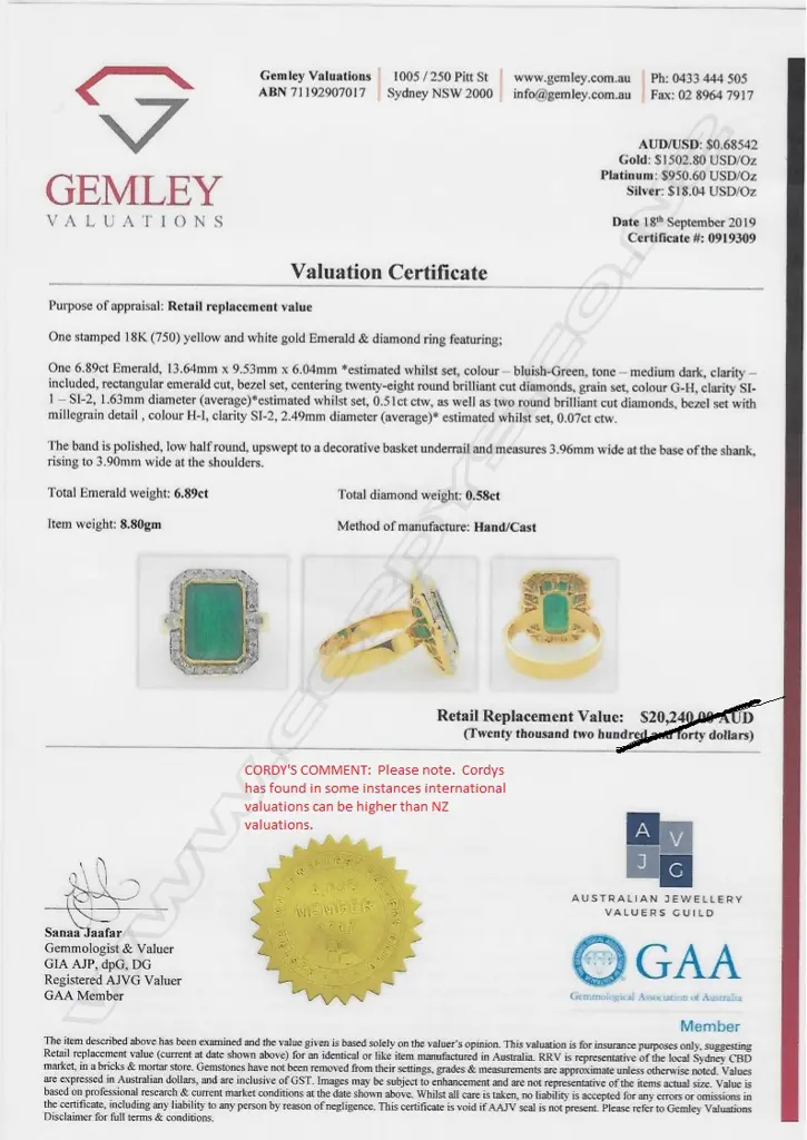 An 18ct yellow and white gold emerald and diamond ring Image 1++