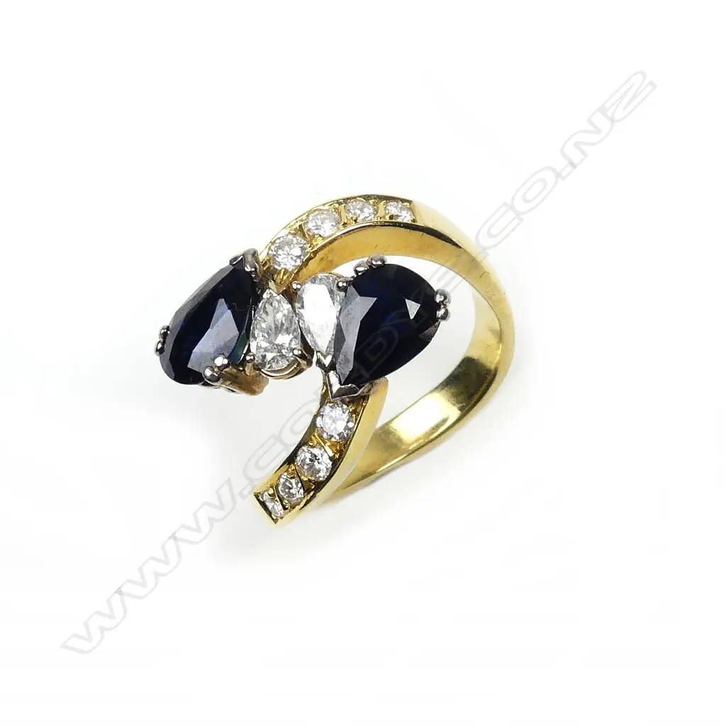 A vintage 18ct. sapphire and diamond ring Image 1++