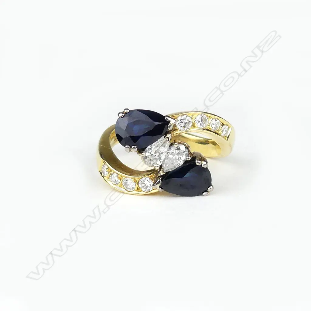 A vintage 18ct. sapphire and diamond ring Image 1++