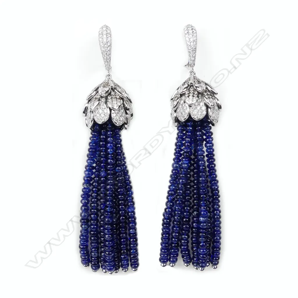 A pair of modern designer 18ct. white gold diamond and sapphire tassel drop earrings Image 1++
